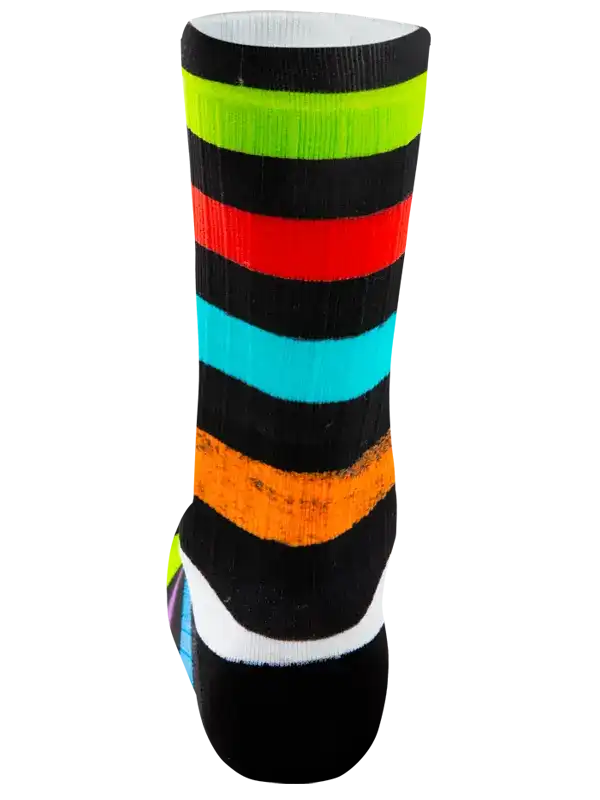 A single crew cycling sock with bold horizontal stripes in black, lime green, red, cyan, orange, white, and a small blue section near the heel, shown on a plain white background.