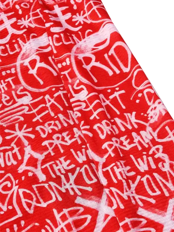 Red cycling jersey with bold white graffiti-style text and graphics for men and women