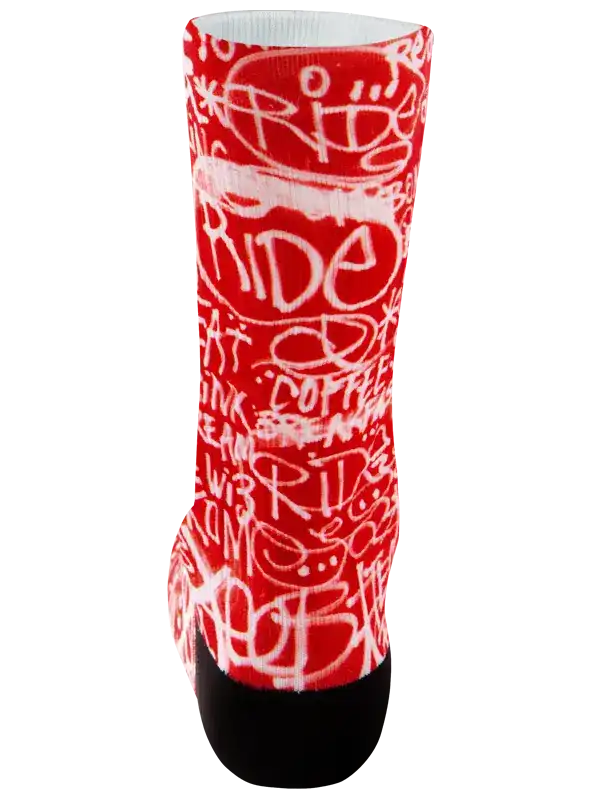 A single crew cycling sock with a red and white graffiti-style pattern featuring the word 'CYCOLOGY' on the side, finished with black toe and heel sections, shown on a plain white background.