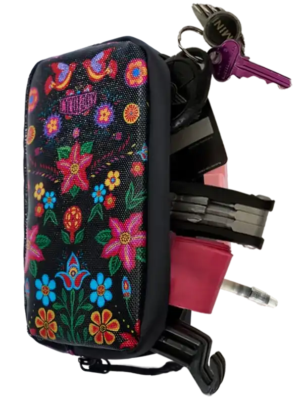 Floral patterned bike frame bag with keys and multi-tool, ideal for cycling storage