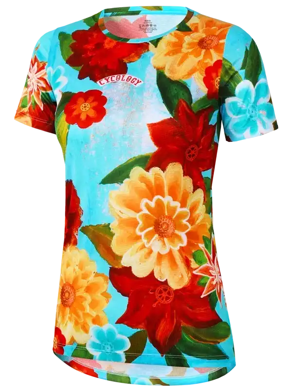 Women's cycling jersey with vibrant floral print on blue background, featuring red, orange, and teal flowers