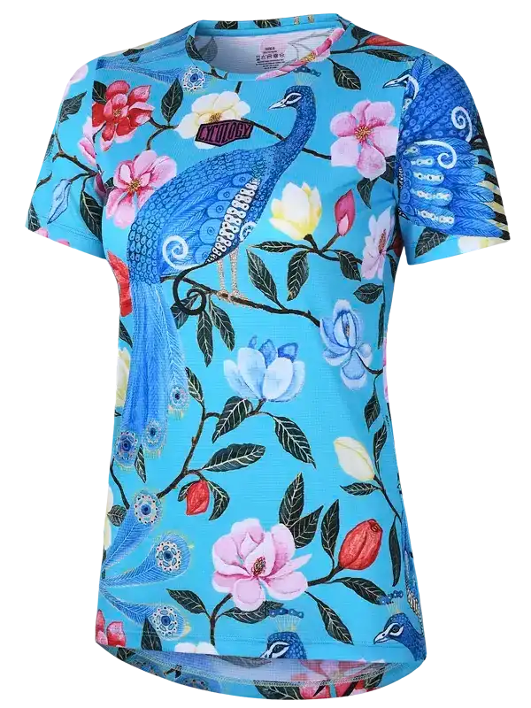 Women's cycling jersey with peacock and floral print on blue background, breathable fabric design
