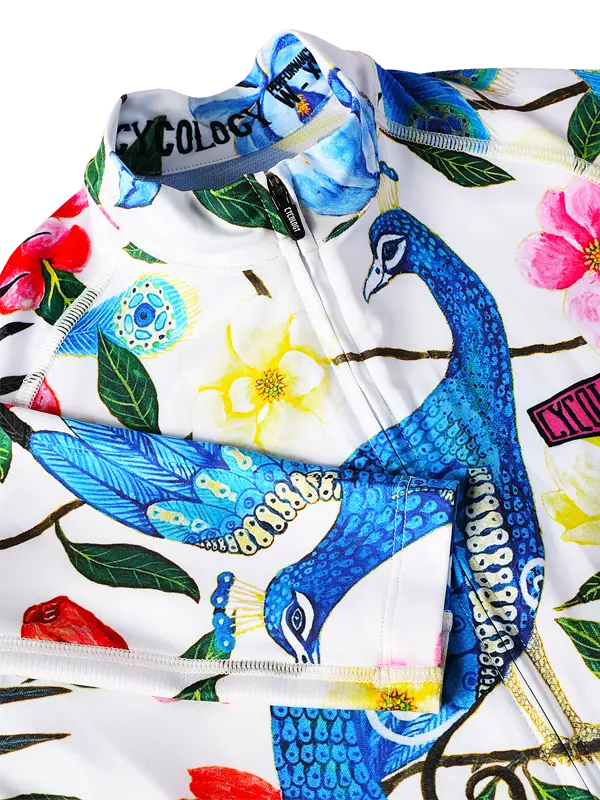 Colorful  Goddess Cycling Jersey  with peacock and floral patterns on a white background