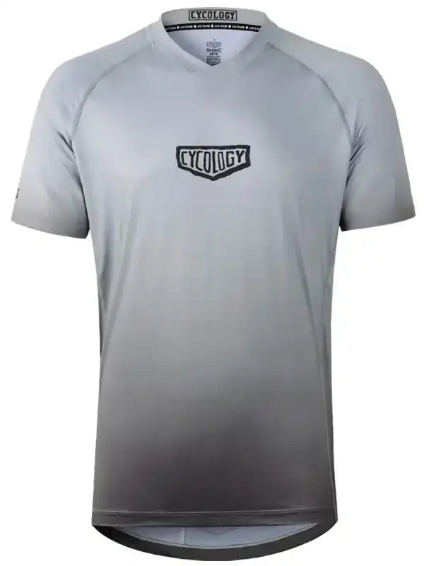 Grey gradient men's cycling jersey with Cycology logo, short sleeves, V-neck, performance fabric