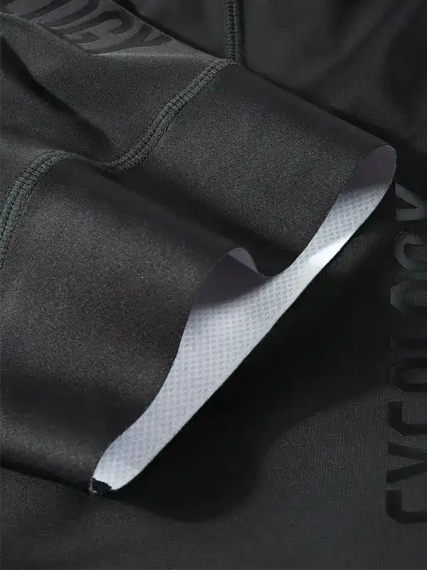 Black cycling shorts with padded chamois, high-quality fabric for comfort and performance