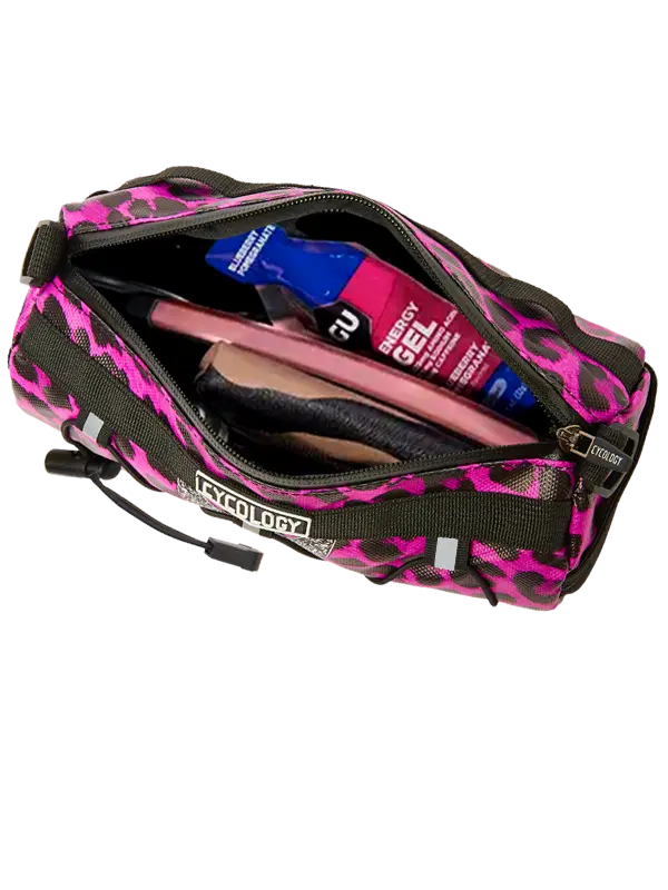 Pink and black bike bag with items inside 