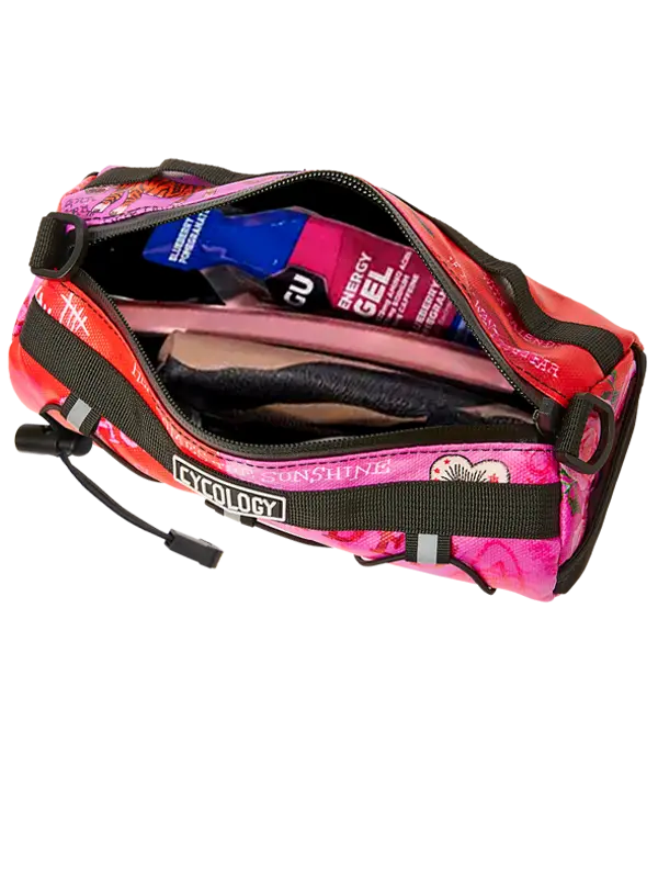 Pink and black bike  bag with energy gels and bike tools