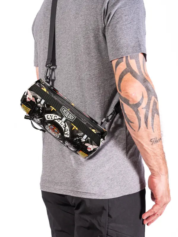 Person wearing Cycology Handlebar Bag – Compact, Stylish, Water-Repellent Bike Bag 