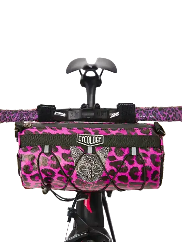 Pink leopard print bike frame bag with Cycology logo, mounted on handlebars for cycling gear storage