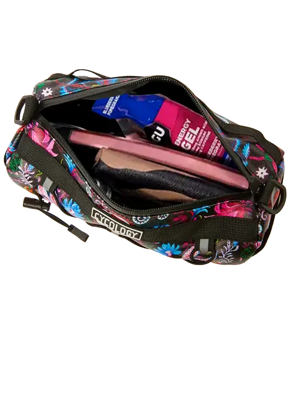 Cycology floral bike bag with energy gel and cycling essentials inside, perfect for rides
