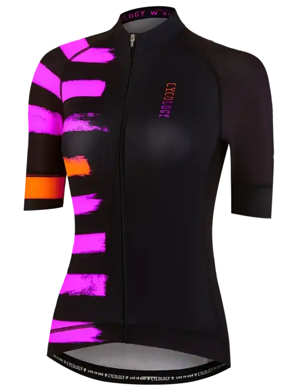 Women's cycling jersey with bold pink and orange brushstroke design on black, featuring full zip and brand logo.