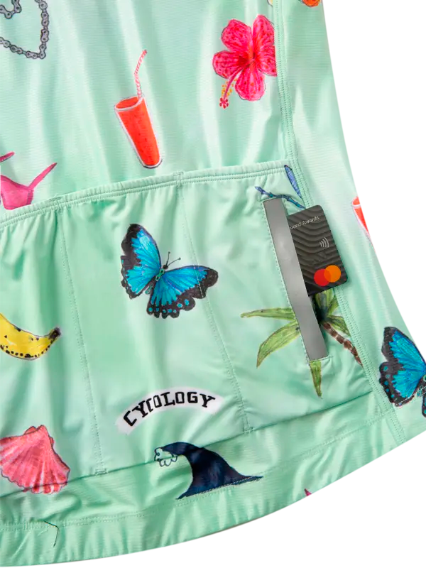 Light green cycling jersey with colorful tropical patterns back pockets