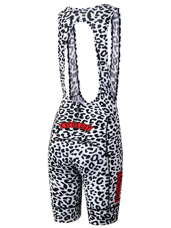 Women's cycling bib shorts with black and white leopard print, red logo, and padded design