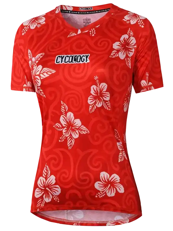Red women's cycling jersey with white hibiscus floral print and swirl pattern, featuring Cycology logo