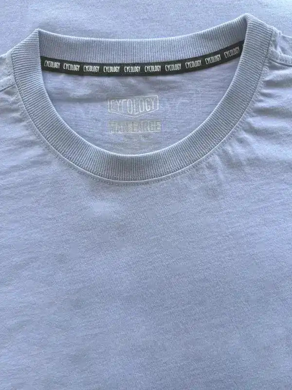 Light gray men's cycling t-shirt with branded neck tape and logo, made from soft fabric for comfort