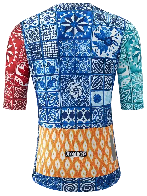 Men's cycling jersey with blue tile pattern, red and teal sleeves, orange hem, and Cycology logo