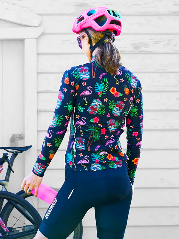 Person wearing a colorful Molokai Black Women's Winter Long Sleeve Cycling Jersey