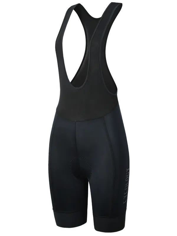 Women's black cycling bib shorts with a wide shoulder strap and a vertical 'CYCOLOGY' logo printed on the lower left leg, 