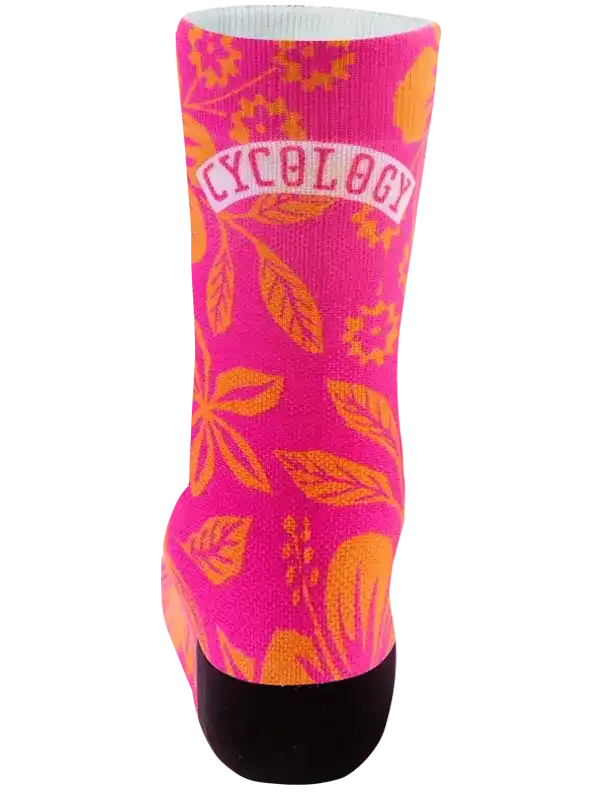 Pink cycling sock with orange leaf pattern and 'CYCOLOGY' logo, ideal for cyclists