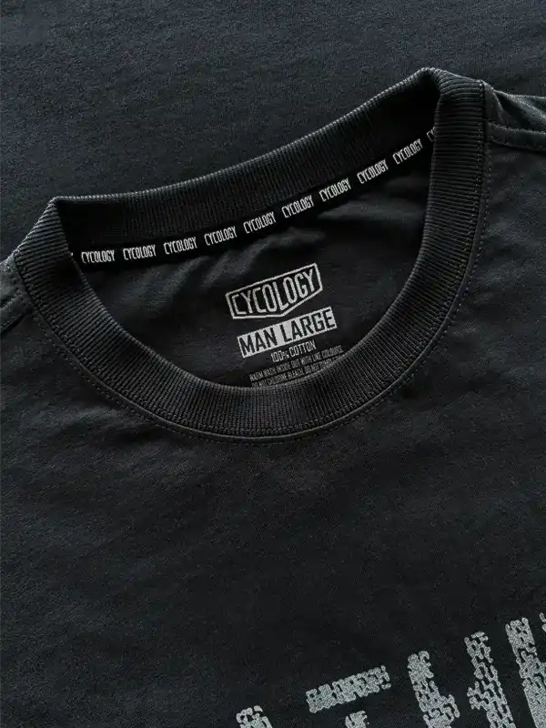 Black men's cycling t-shirt with 'Cycology' tag, 100% cotton, large size, featuring brand logo on neckline.