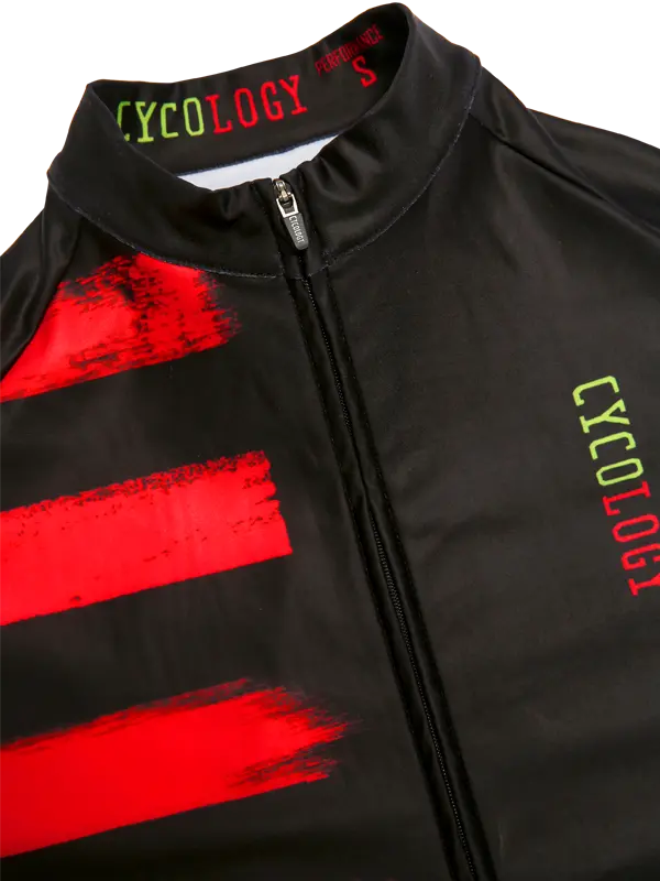 Black cycling jersey with red accents and 'CYCOLOGY' branding