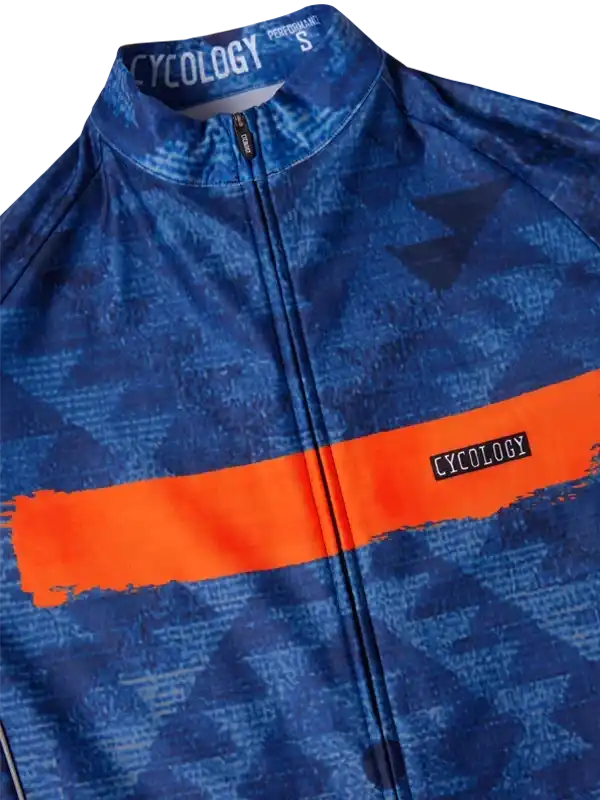 Blue cycling jersey with orange stripe, geometric pattern, and Cycology branding for men's or women's rides