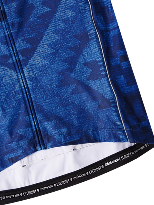 Blue jersey with orange patches on back pockets and a visible brand cycology logo