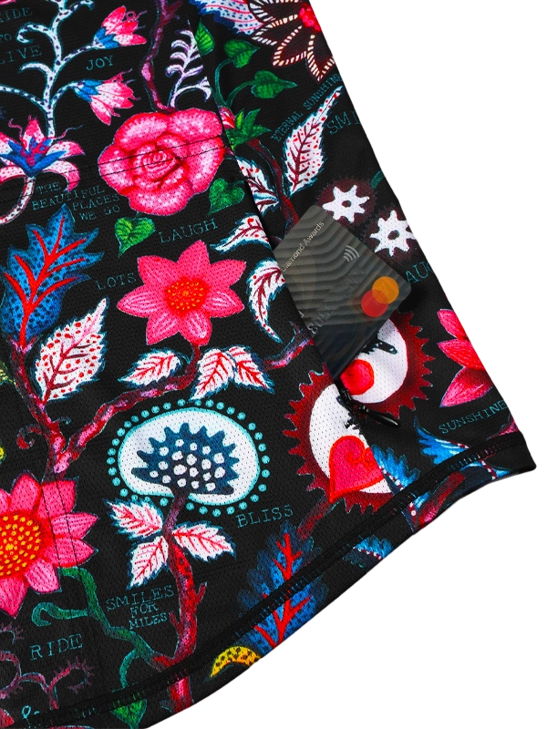 Women's Colorful floral and paisley patterned long-sleeve MTB Jersey on a Black background