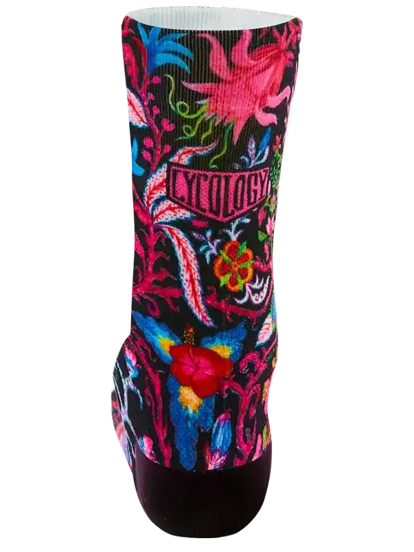 Vibrant floral cycling sock with bold pink, blue, and red patterns on black background