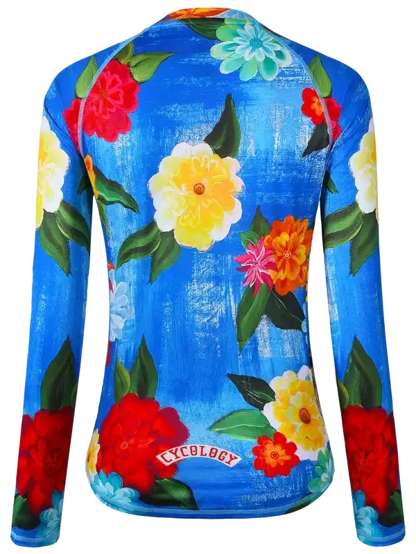 Women's blue floral cycling jersey with vibrant flowers and green leaves, long sleeves, back view