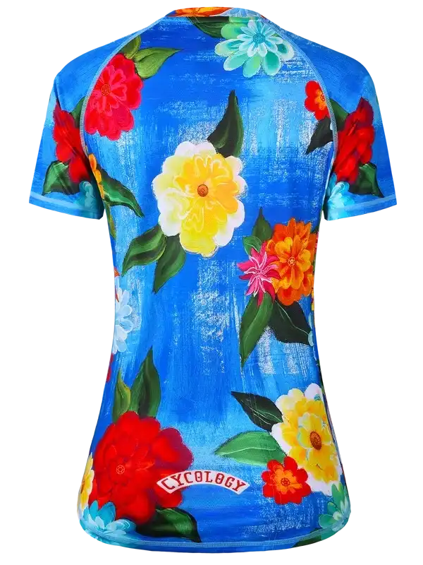 Blue cycling jersey with vibrant floral print and 'Cycology' logo for women's bike wear