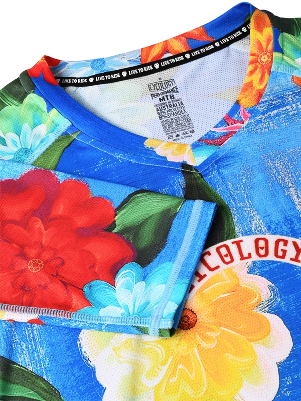 Women's Colorful floral long-sleeve  MTB Jersey with 'Cycology' branding V neck 