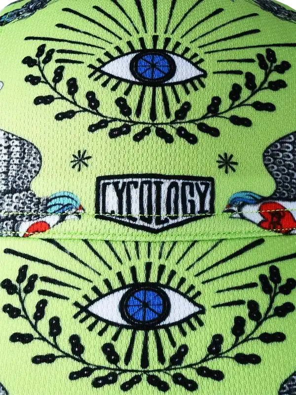 Vibrant green cycling cap with eye and bird graphics, bold 'CYCOLOGY' logo, unique design for riders