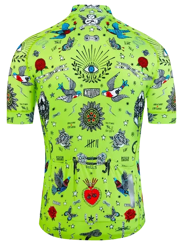 Vibrant green cycling jersey with tattoo-style designs, roses, birds, and stars for men and women.