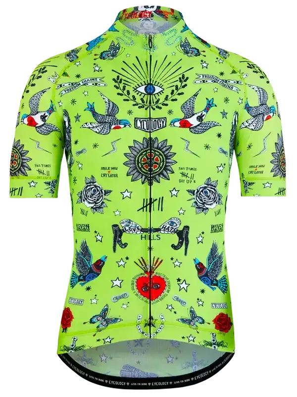 Vibrant green men's cycling jersey with tattoo-style birds, roses, and eye design, featuring full zip and performance fabric.