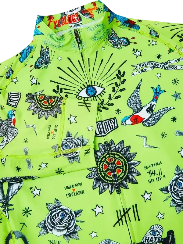 Neon green cycling jersey with tattoo-style graphics, roses, eyes, and stars for men's or women's bike rides