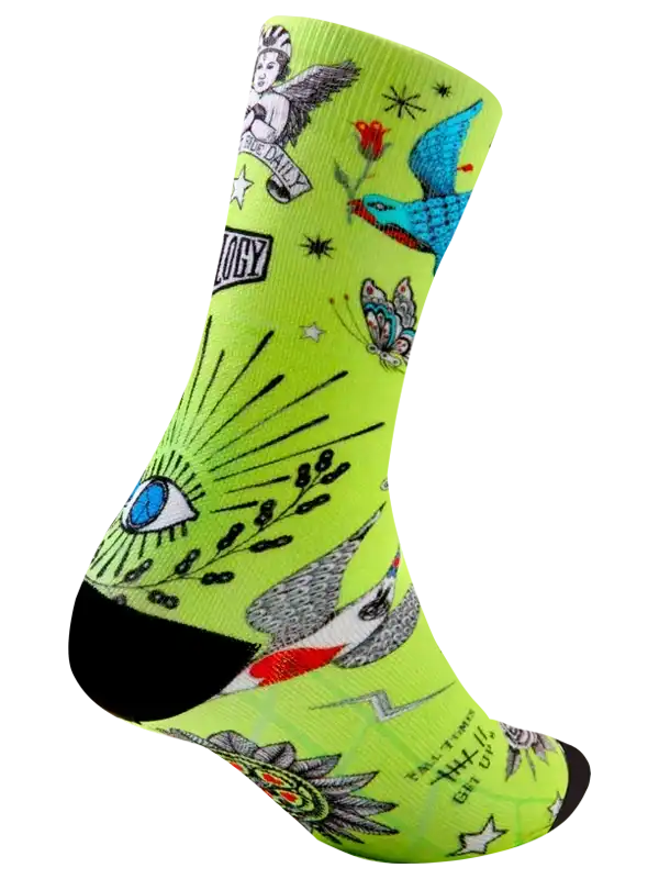 Bright neon green cycling sock with tattoo-style graphics, birds, eyes, and stars for men's or women's bike rides