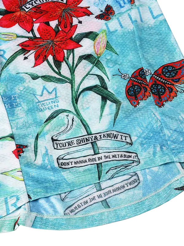 Sleeveless base layer  with floral and butterfly design on a aqua background