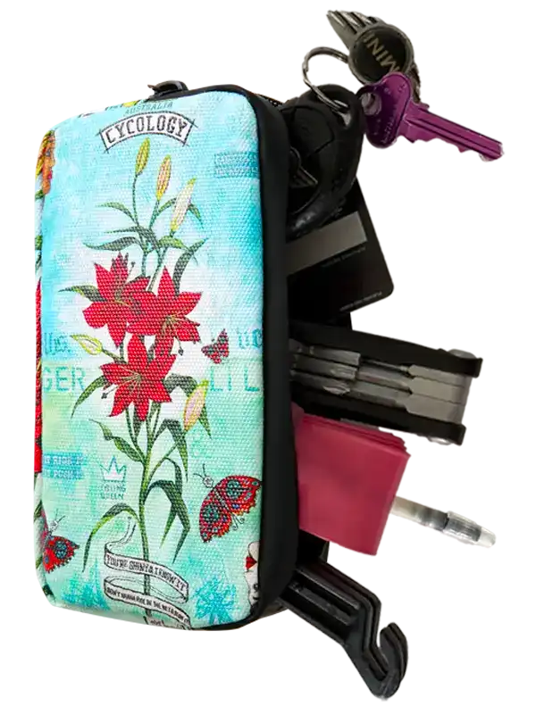 Tiger Lily cycling wallet by Cycology Clothing with floral design and attached keys.