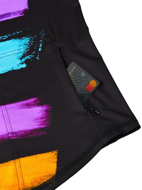 Women's Black short-sleeve MTB Jersey with colorful accents and 'Cycology' branding with rear zip pocket