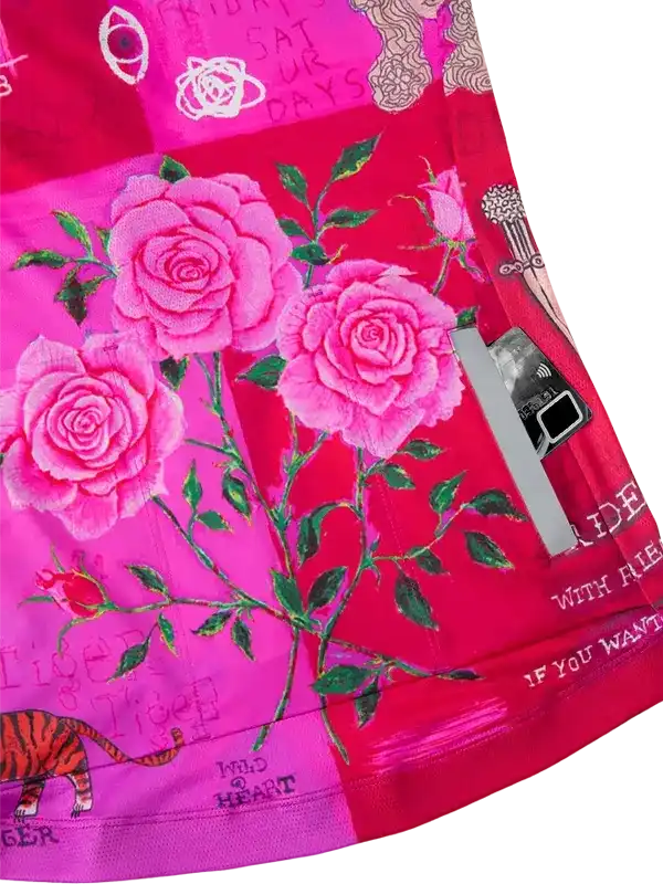 Pink floral cycling shorts with rose print, zip pocket, and tiger design for women's bike wear