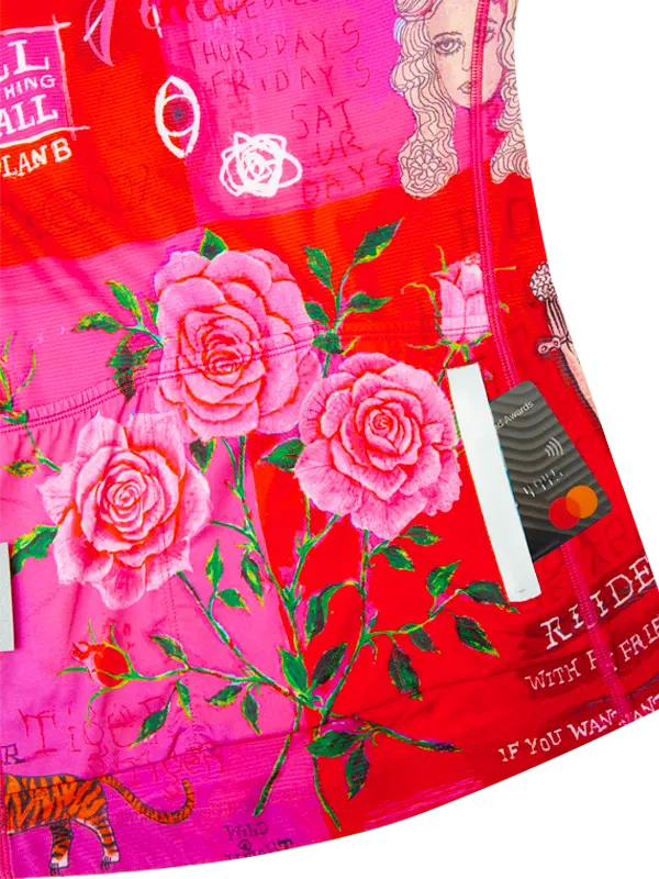 Red fabric with pink roses and text with back zip pocket 