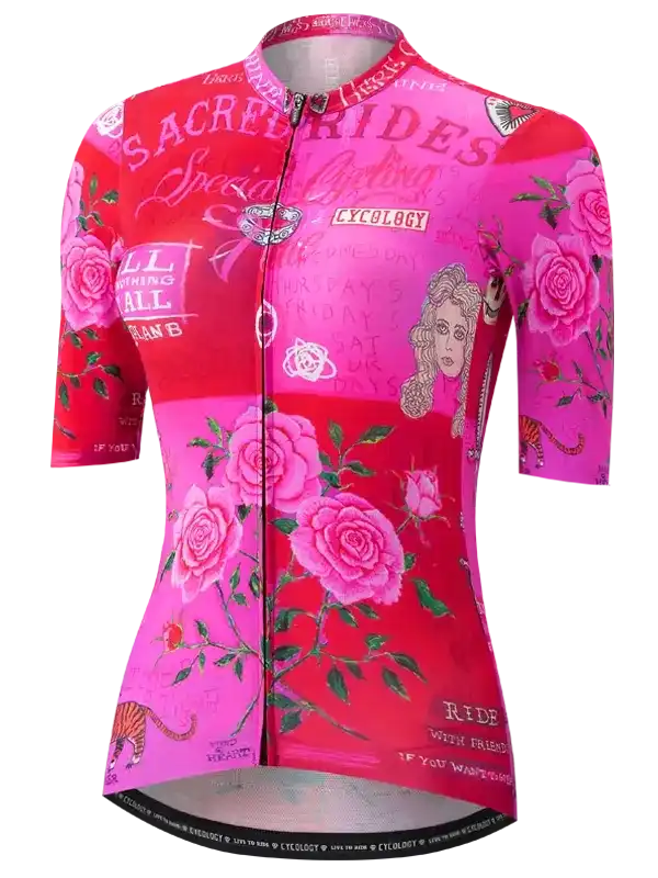 Women's pink cycling jersey with rose print, 'Sacred Rides' text, and vintage graphics for road biking