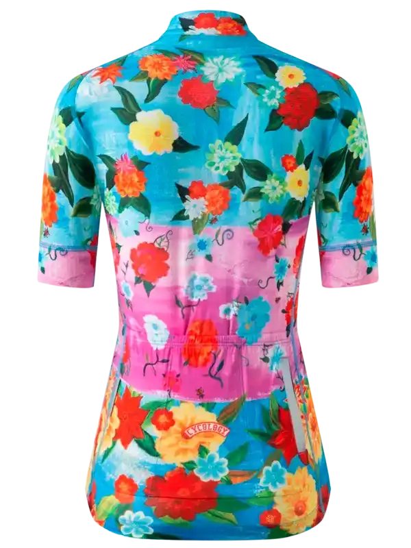 Women's floral cycling jersey with vibrant blooms, pink accents, and rear pockets for bike rides