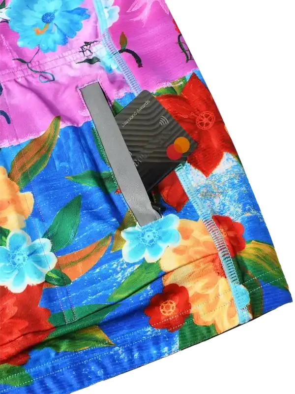 Vibrant floral cycling shorts with secure zip pocket for cards, ideal for men's and women's rides