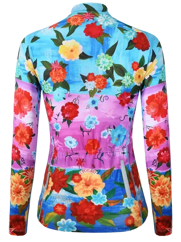 Women's floral cycling jersey with vibrant blue and pink print, long sleeves, and rear pockets