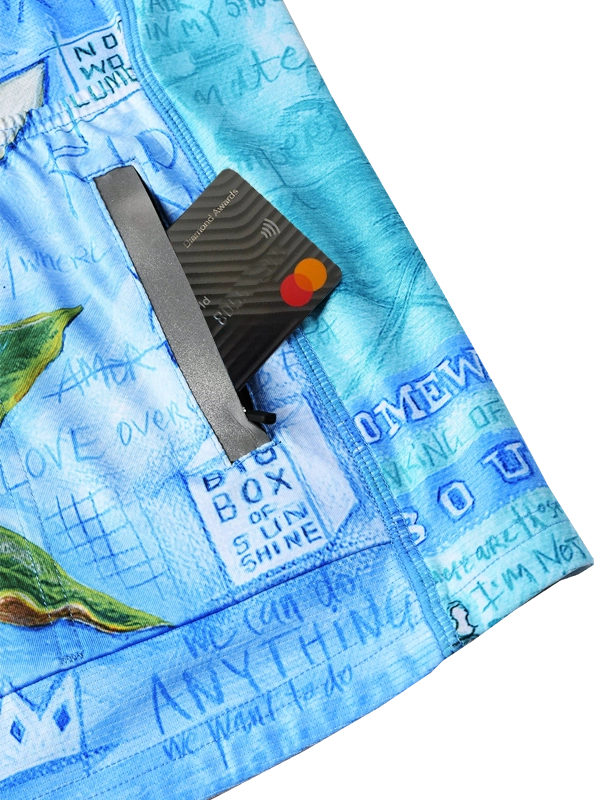 Blue women's long sleeve cycling jersey with floral and bird design back pockets