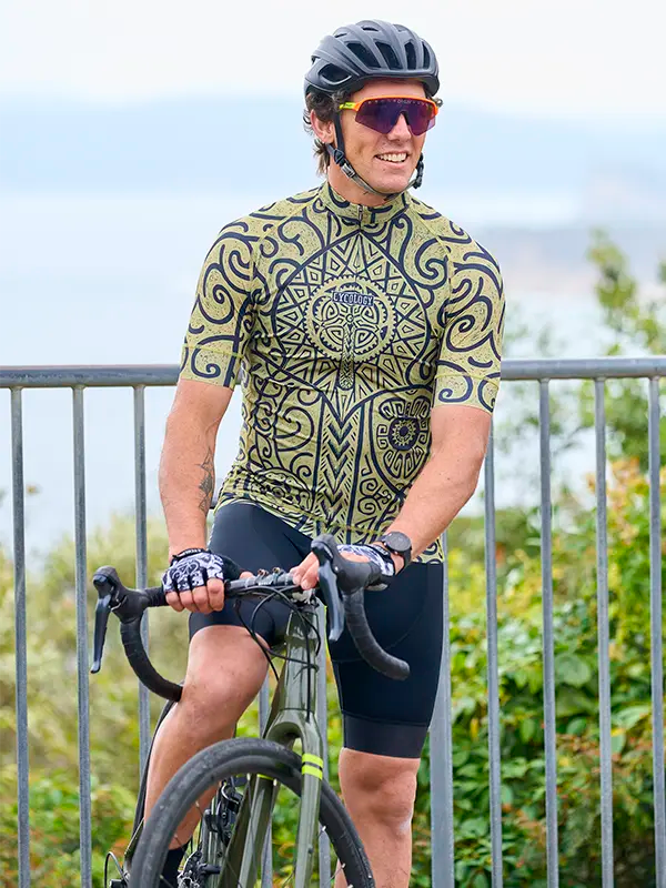 Zanzibar Green Men's Cycling Jersey model on bike  | Cycology UK