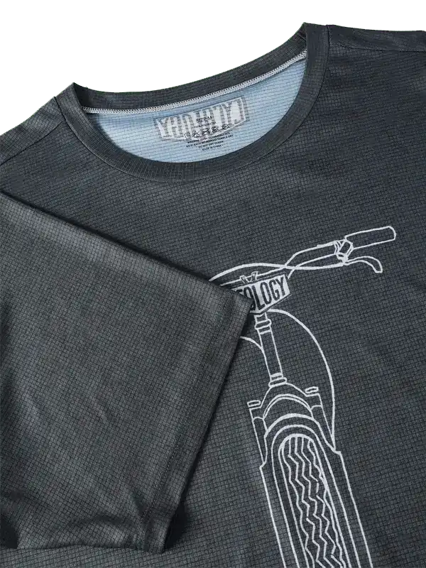 Men's dark grey cycling jersey with white bike graphic and 'Cycology' text, featuring breathable fabric texture.