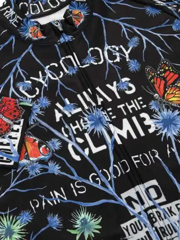 Black cycling jersey with butterfly and thistle print, bold text 'Always Choose The Climb'